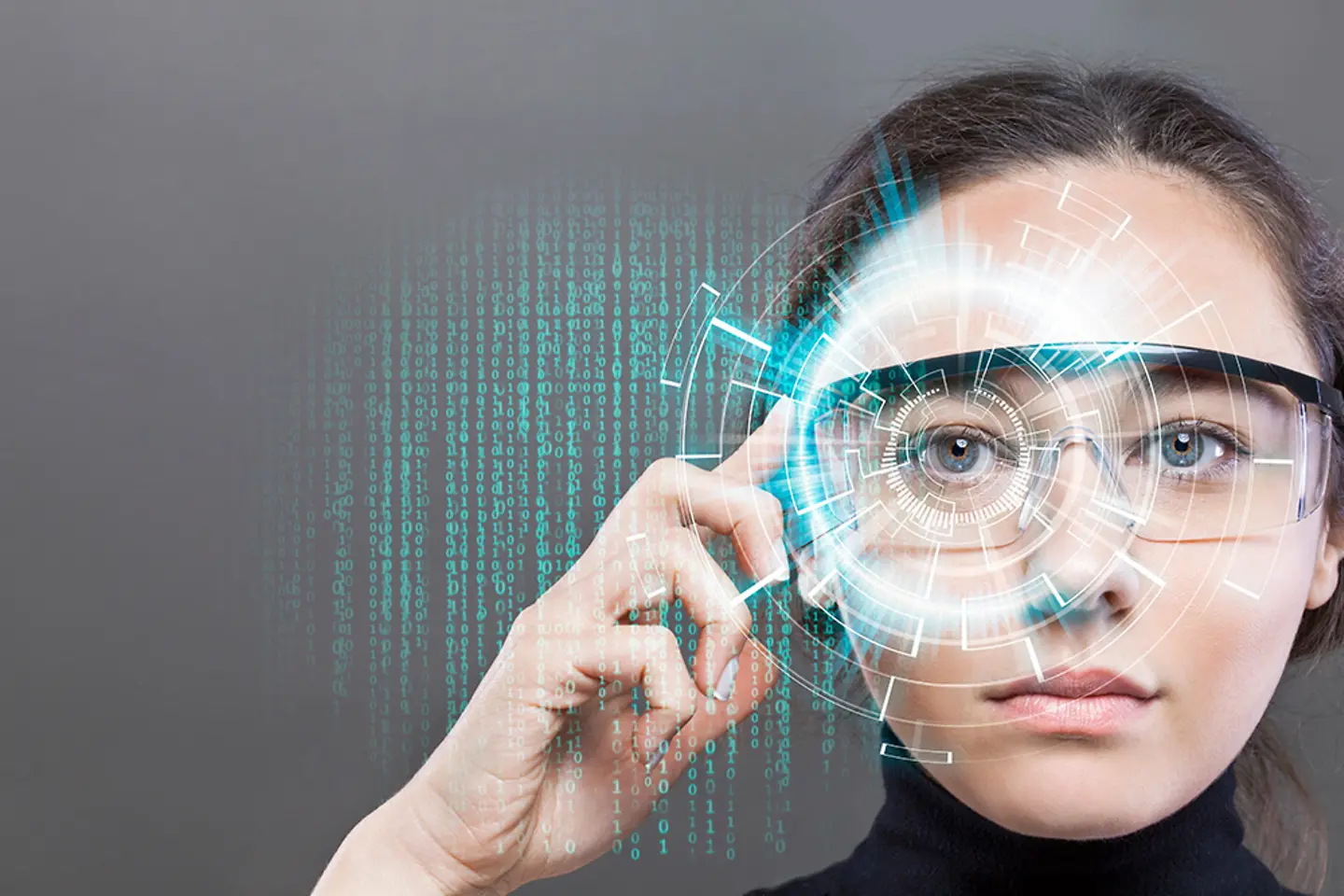 A programmer wearing AR/VR glasses