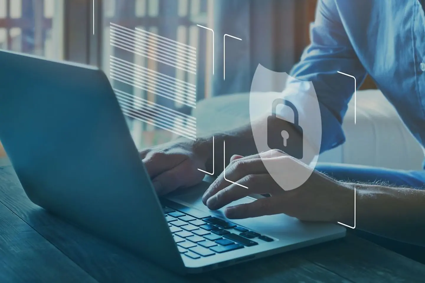 Cyber security hologram over laptop
