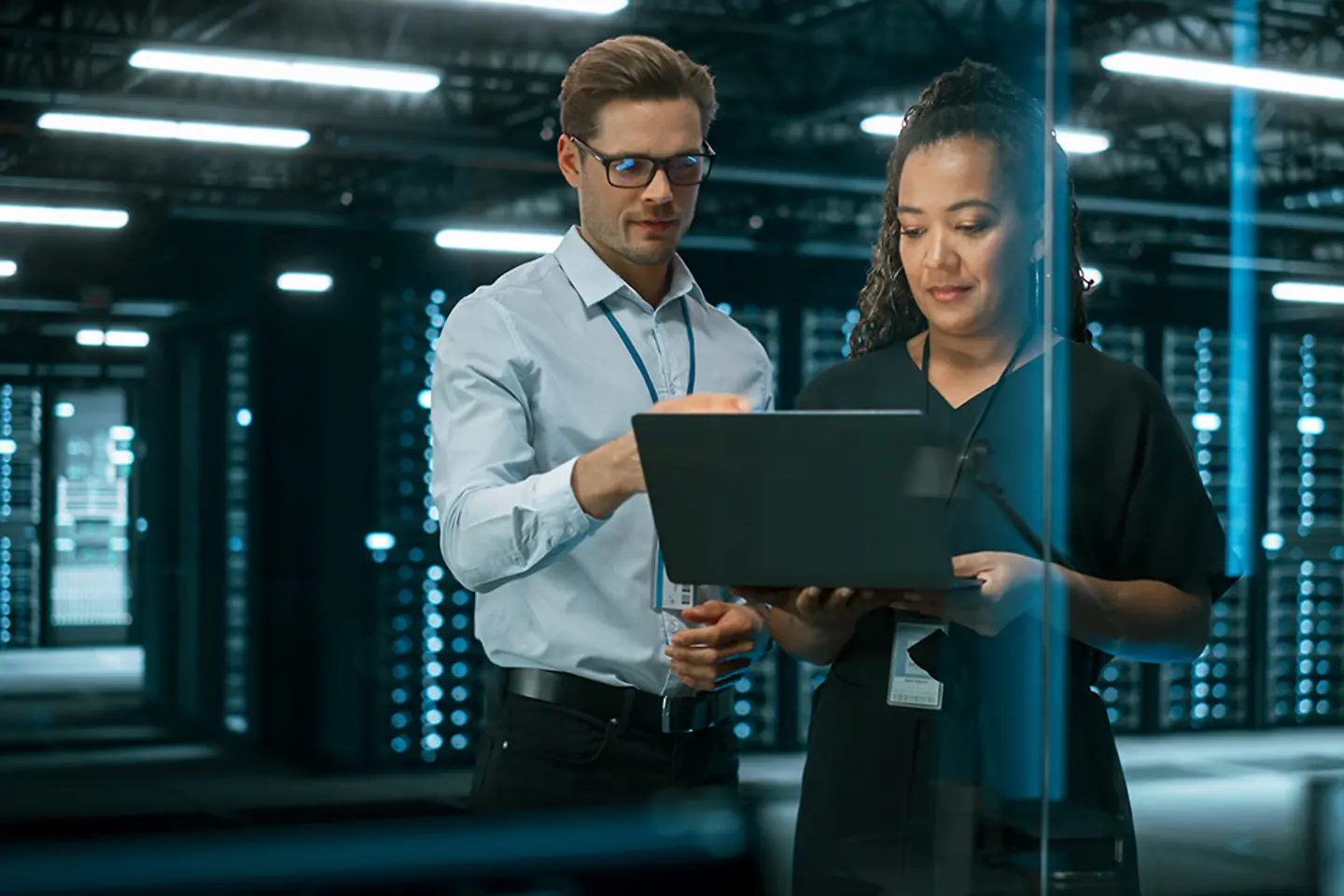 Software professionals using cloud on laptop